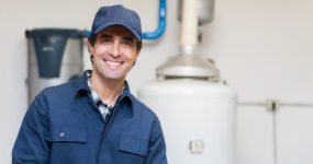 Technician ready to service hot water heater